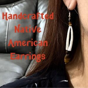 Native American handmade earrings made from tiger’s eye beads and dentalium